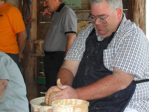 dad throwing a pot